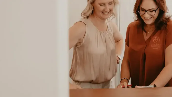 The Evolve Chiropractic team at the front desk